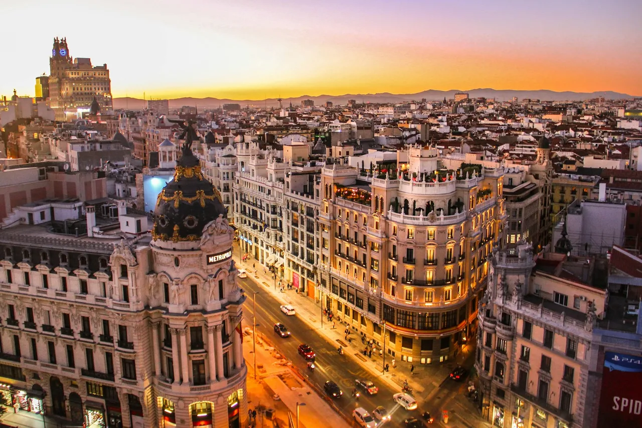 Central Madrid streets and ornate buildings at sunset